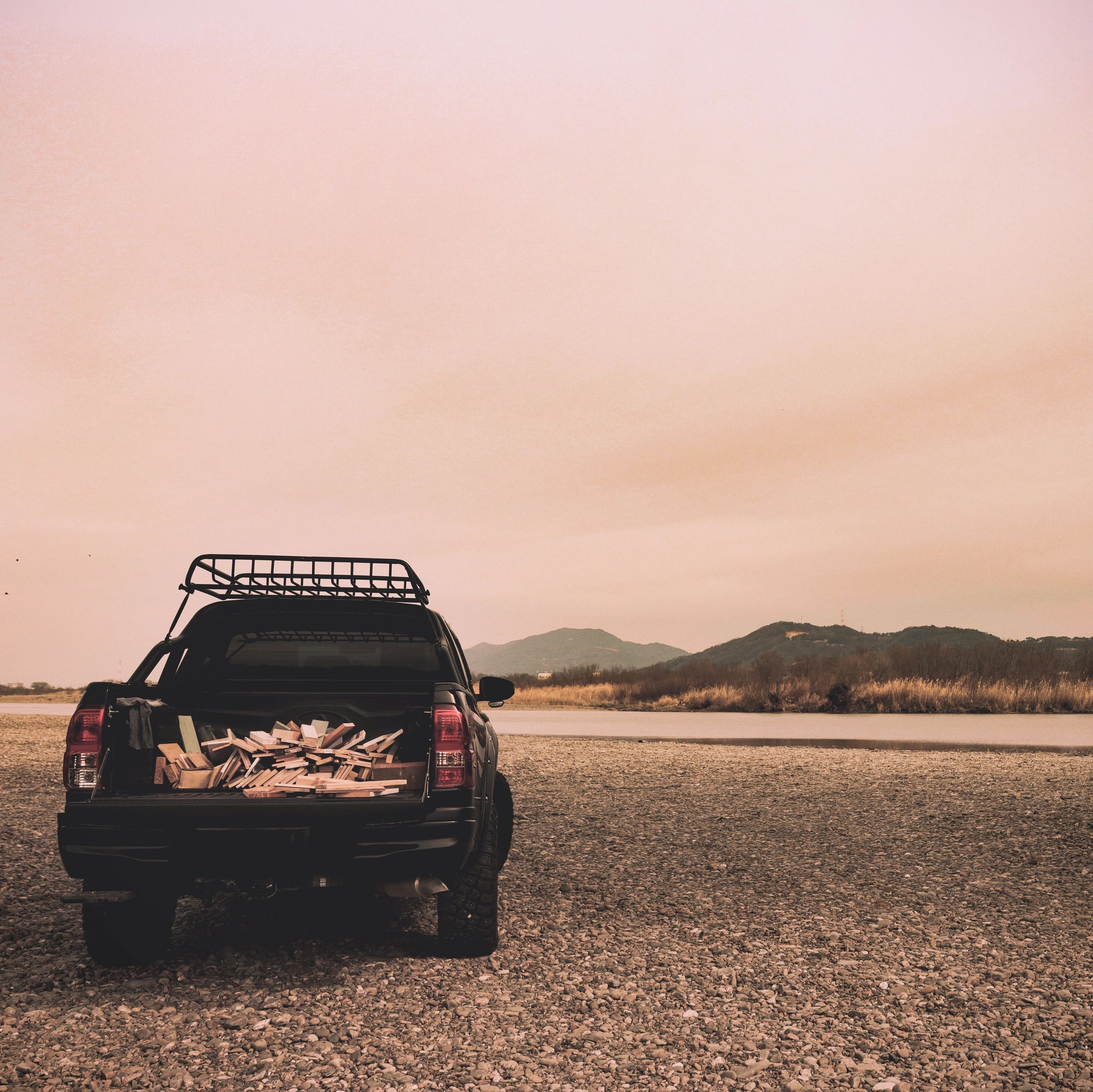 All-wheel-drive SUV beside a lake