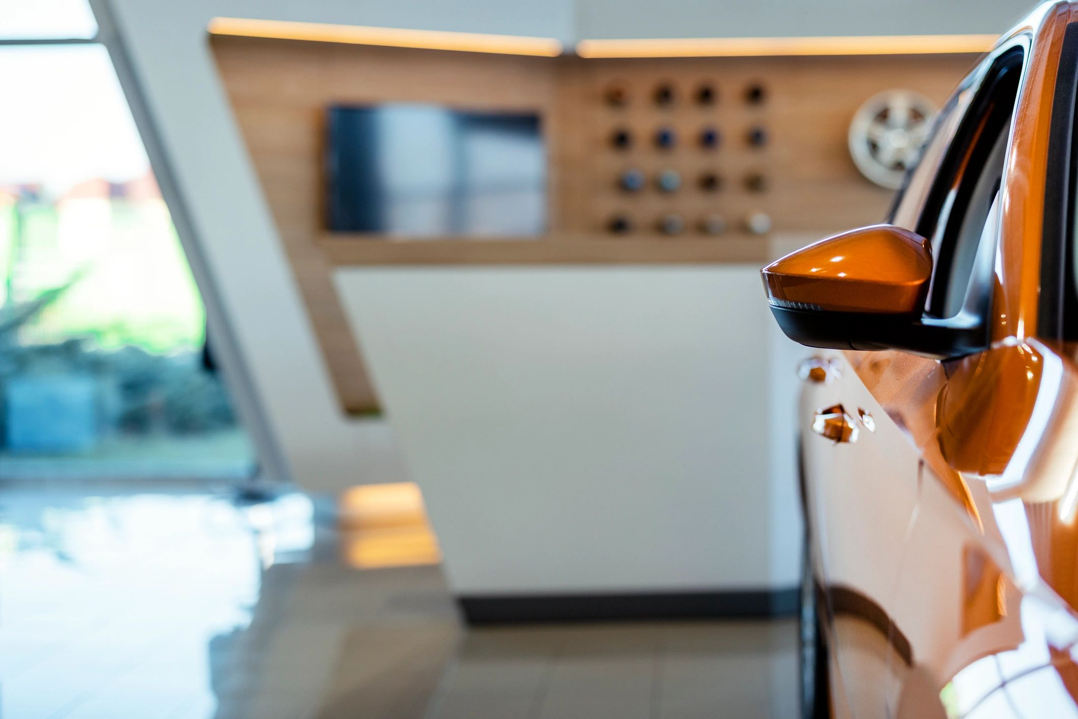 Vehicles displayed in a dealership showroom