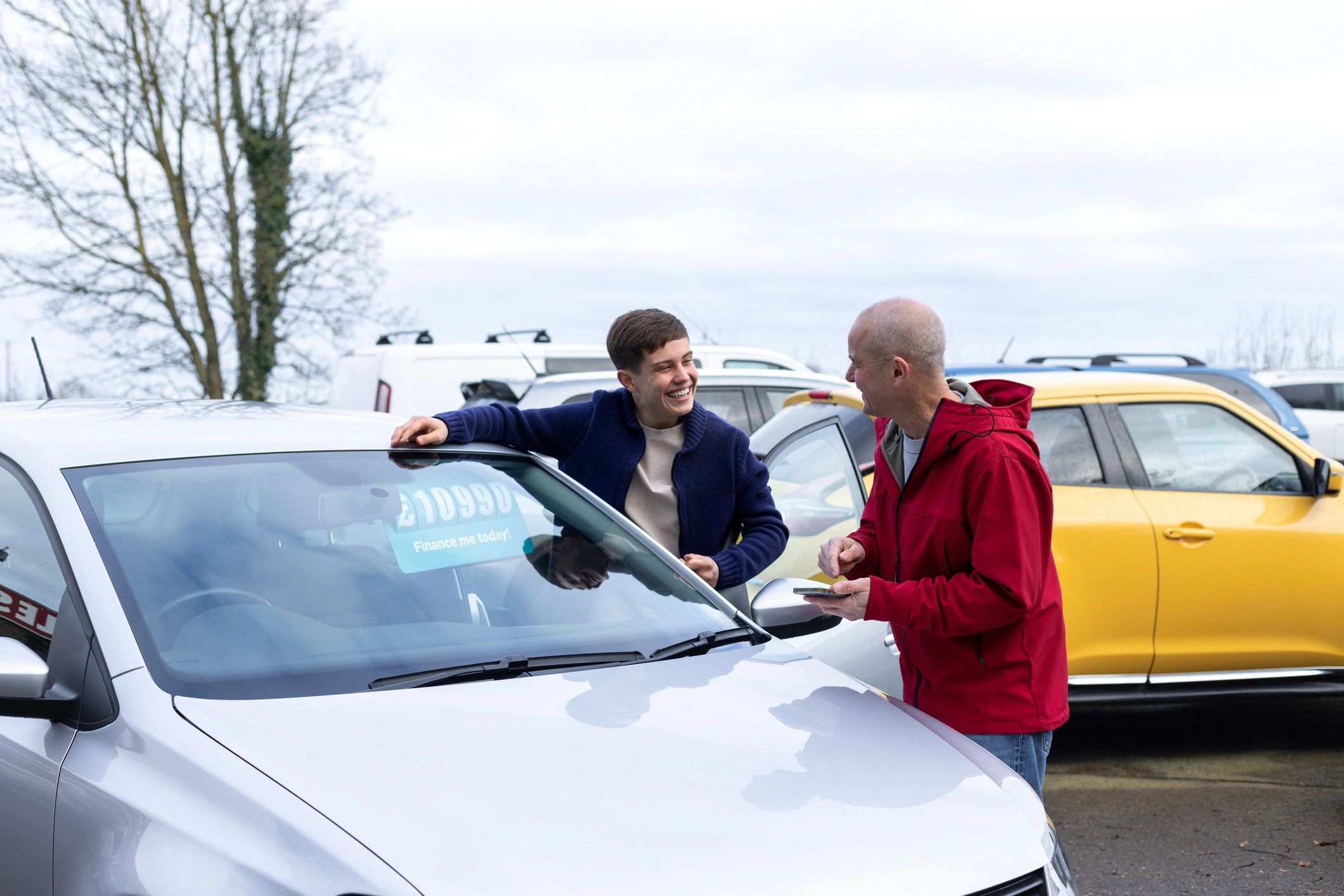 Customers shopping for a new car